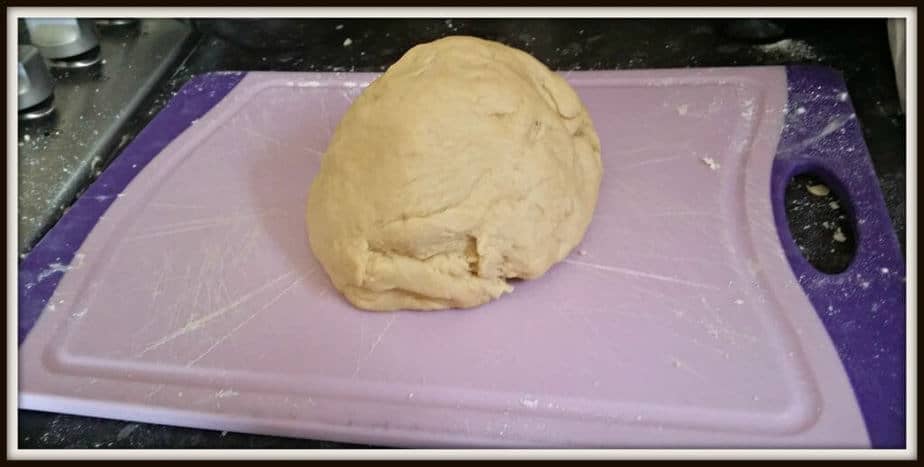 Turn the dough onto a floured surface and knead for about 5 minutes, or until smooth and elastic