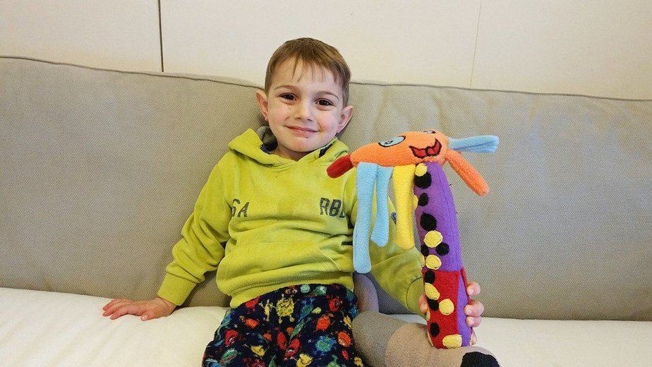 My 4 year old and BatCat on the couch - Petplan UK -motherhooddiaries