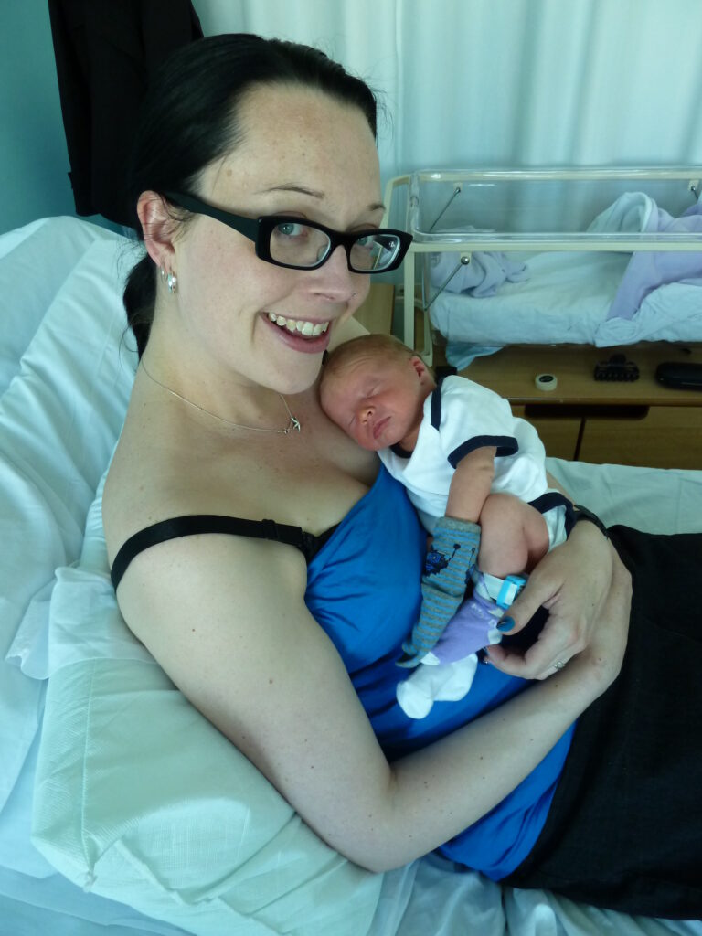 Clare Doble holding her newborn
