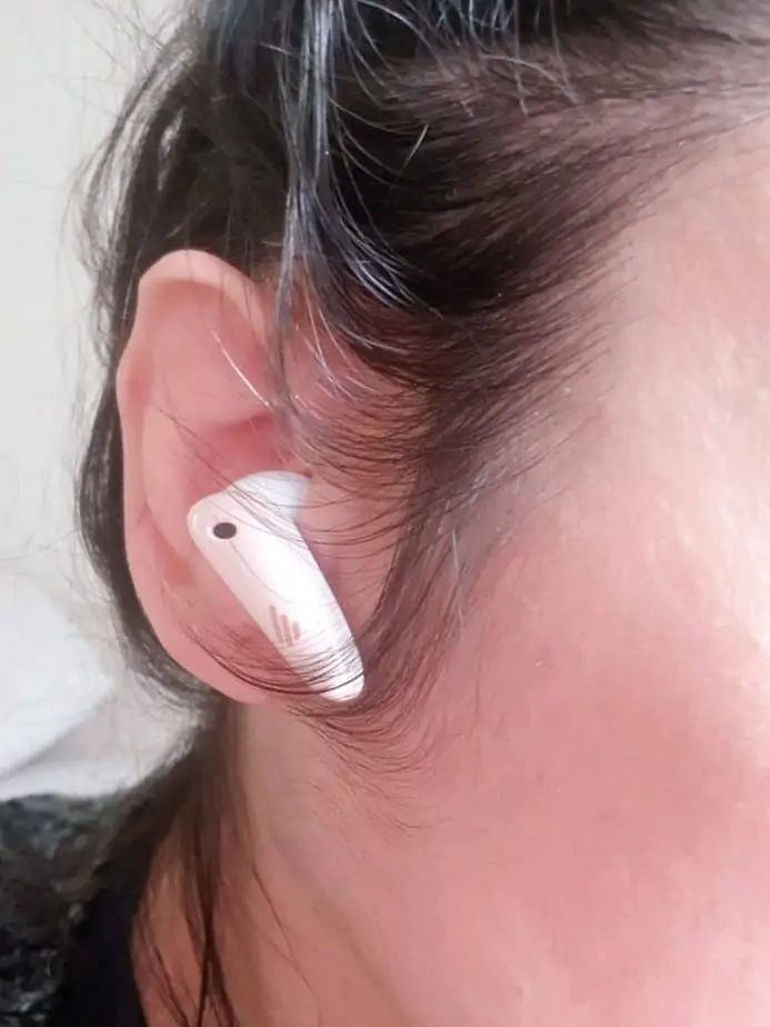 Motherhood Diaries modelling the Edifier TWS NBQ earbuds