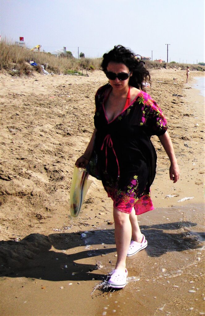 Red tummy control swimsuit and kaftan to hide pregnancy bump