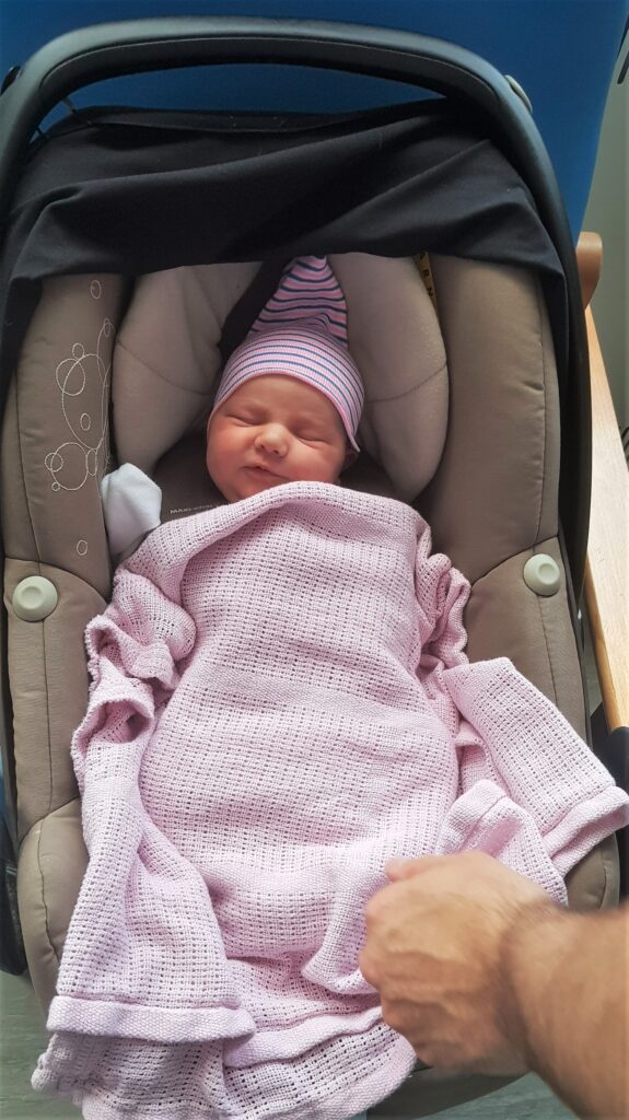 Amelia in the car seat