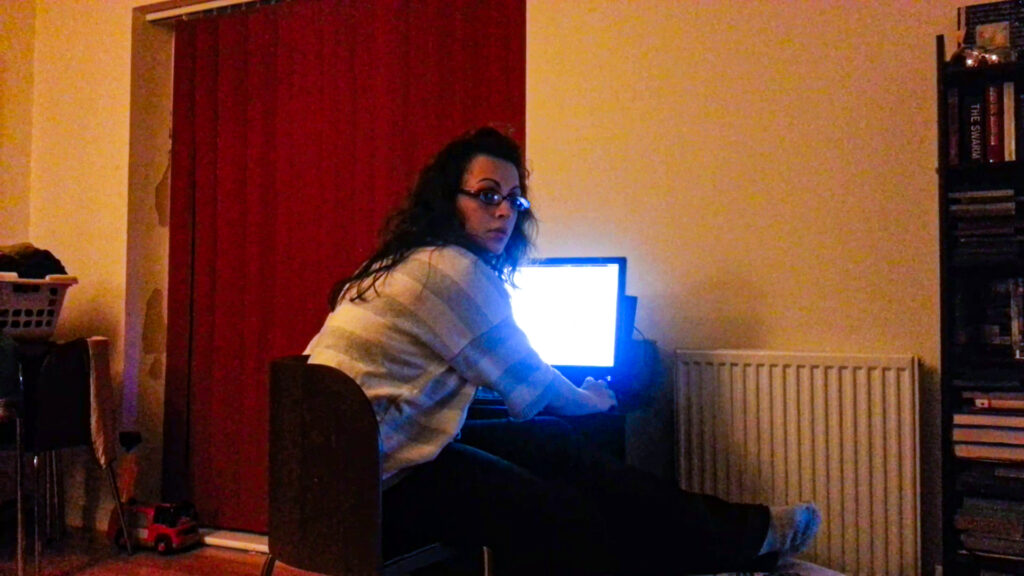 Forced to work in a corner because we hadn't set up a proper office after rearranging the lounge - - working from home without childcare